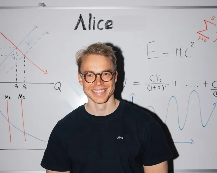 Kim Rants, founder of alice, in front of a whiteboard